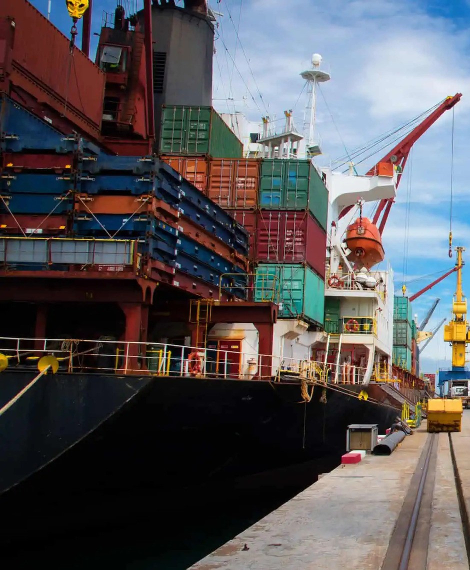 Cargo ship, airplane, and truck representing global logistics services
